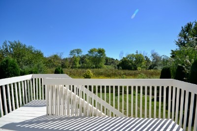 766 Graham Road North Aurora, IL 60542 - Photo 4 of 21 a view of a wooden roof deck