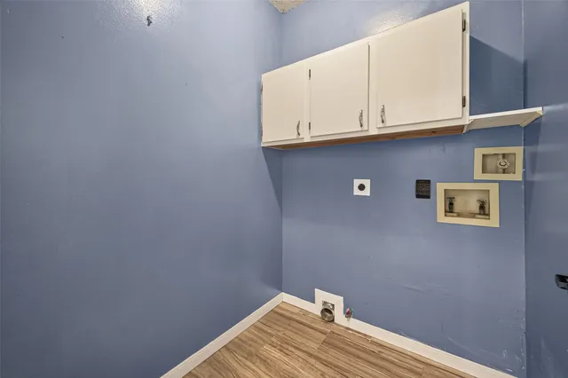 a bathroom with a granite countertop toilet sink shower and mirror