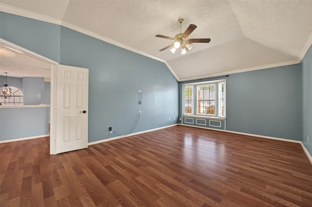 a spacious bathroom with a double vanity sink a mirror and a shower