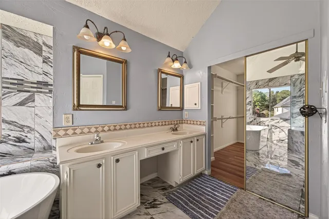 a bathroom with a sink and a bathtub