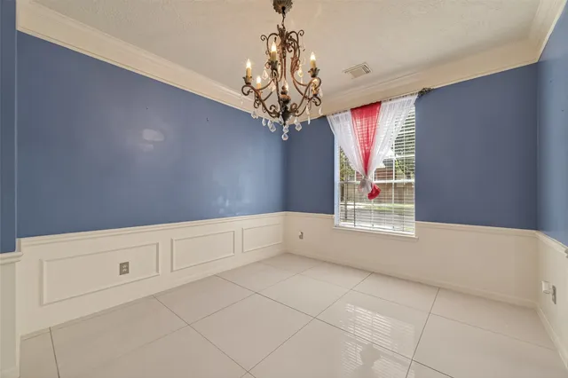 a view of a chandelier in a room