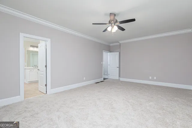 a bath tub sitting next to a window