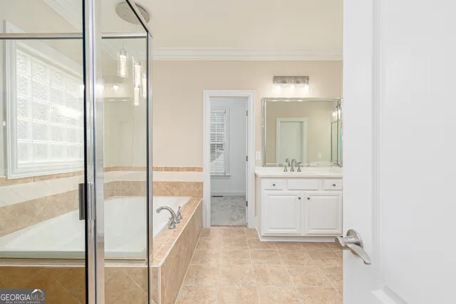 a bathroom with a sink and a bathtub