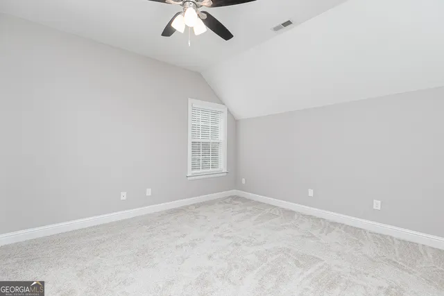 a bathroom with a tub and shower