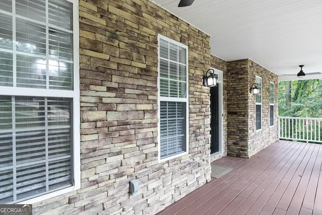 a view of a door with wooden floor