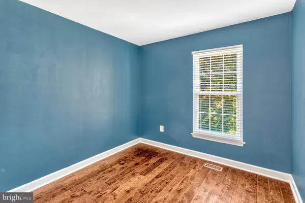 a view of a room with a window