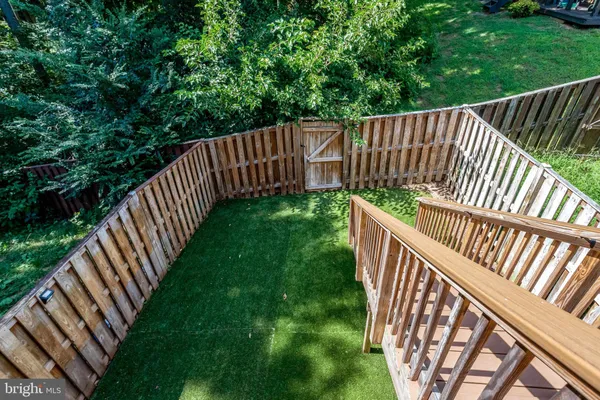 a view of deck and garden