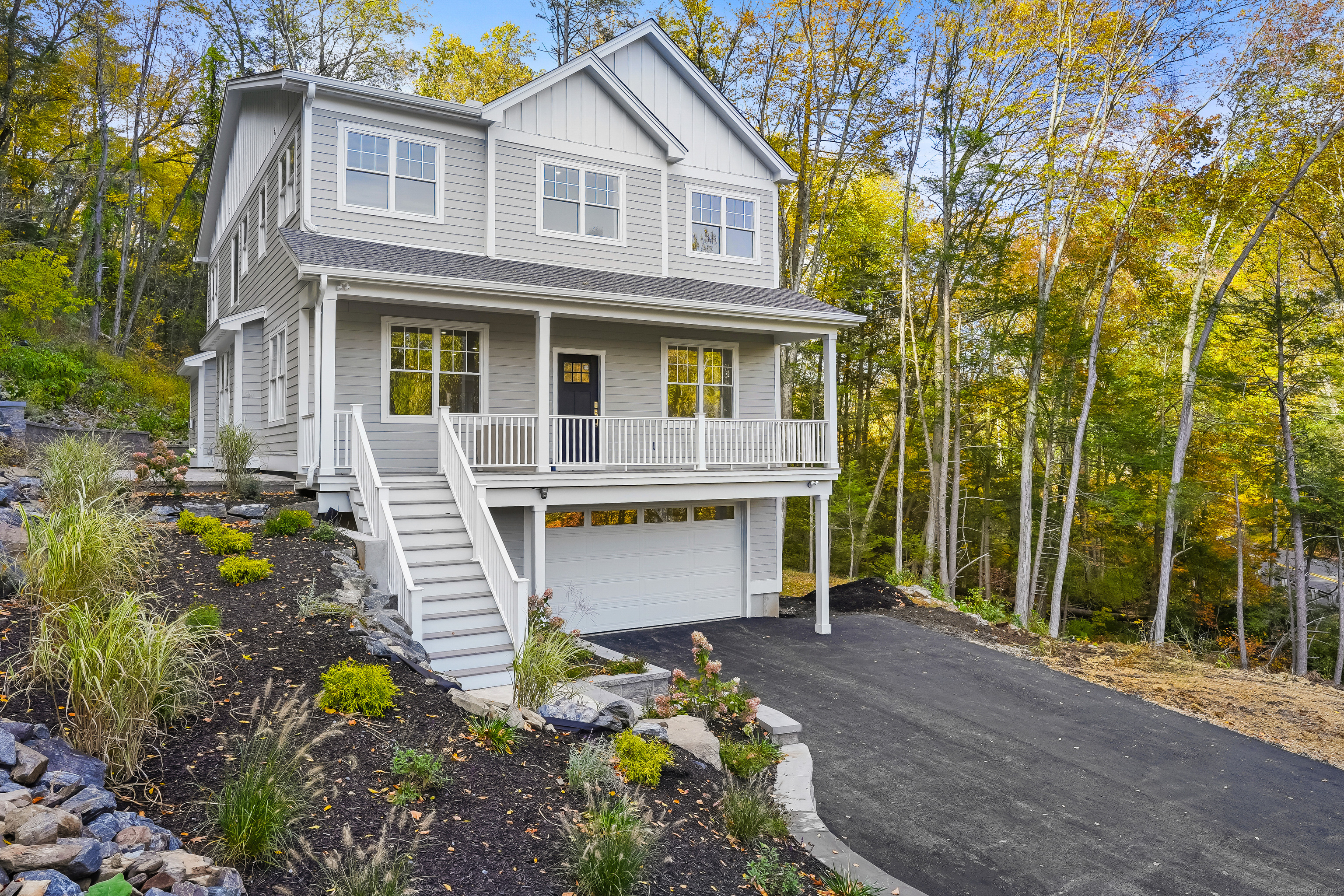 175 Hollow Swamp Road Southbury, CT 06488 - Photo 1 of 1 Front of home showing covered porch and paved driveway