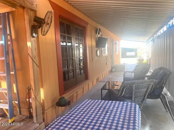 a view of a balcony dining area