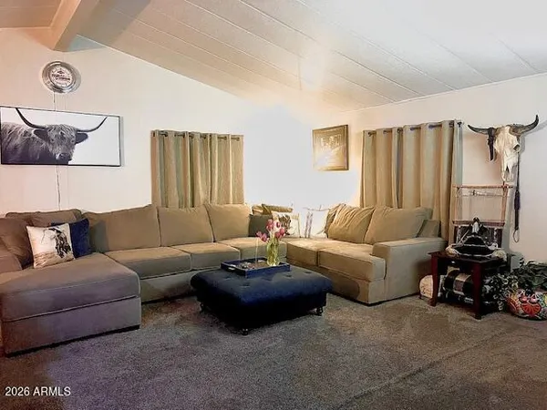 a living room with furniture and a couch