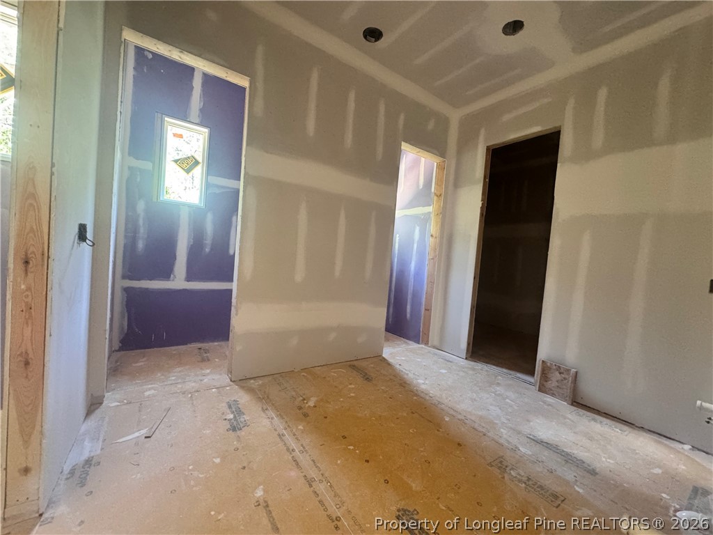 45 Beckett Ridge Pinehurst, NC 28374 - Photo 5 of 50 a view of a hallway with wooden shelves