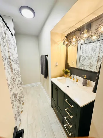 a bathroom with a toilet and a sink