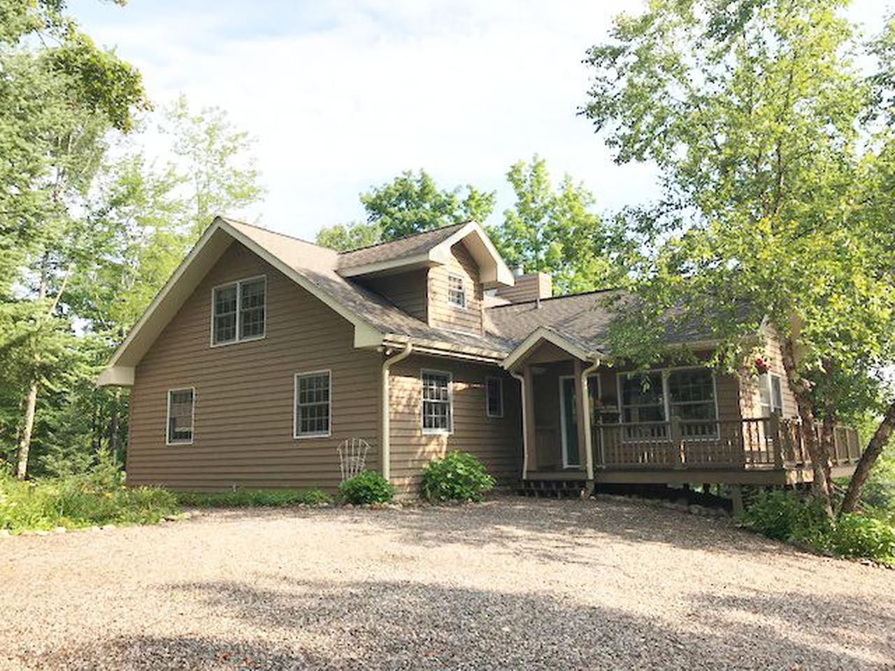 11584 Rays Drive Presque Isle, WI 54557 - Photo 1 of 55 Gallery Image 1