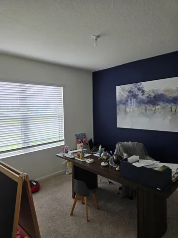 a room with furniture and window