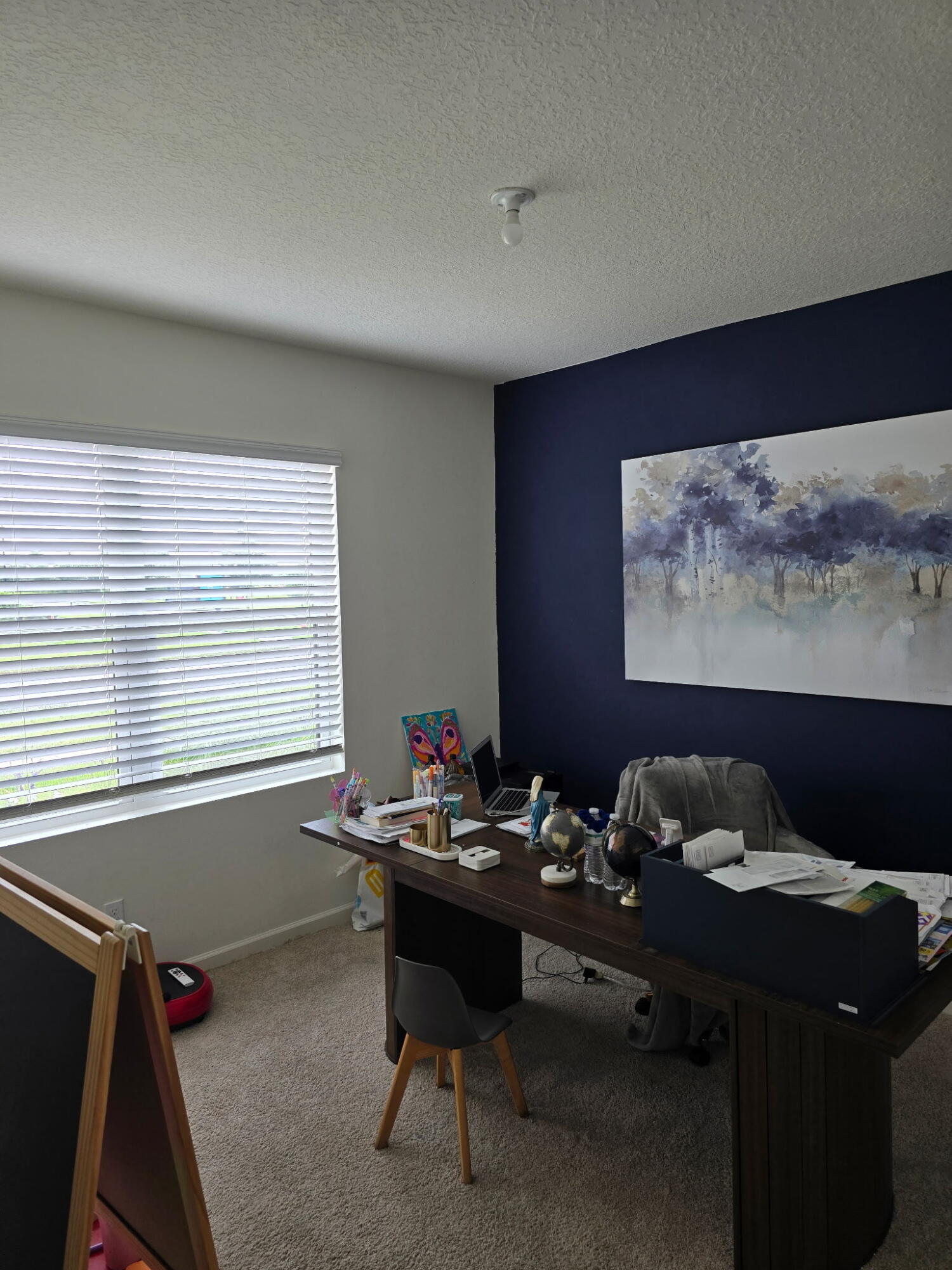 9725 Southwest Triton Way Port Port St. Lucie, FL 34987 - Photo 5 of 12 a room with furniture and window