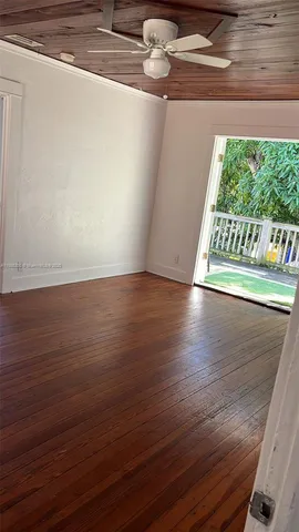 a bathroom with a sink a toilet and bathtub