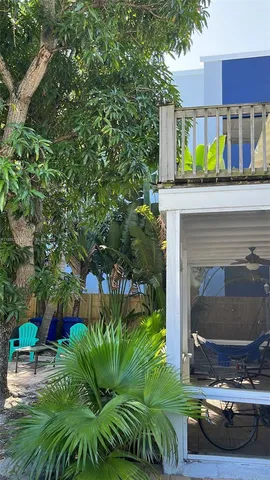 a view of a bench in a backyard