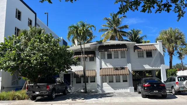 a car parked in front of a house