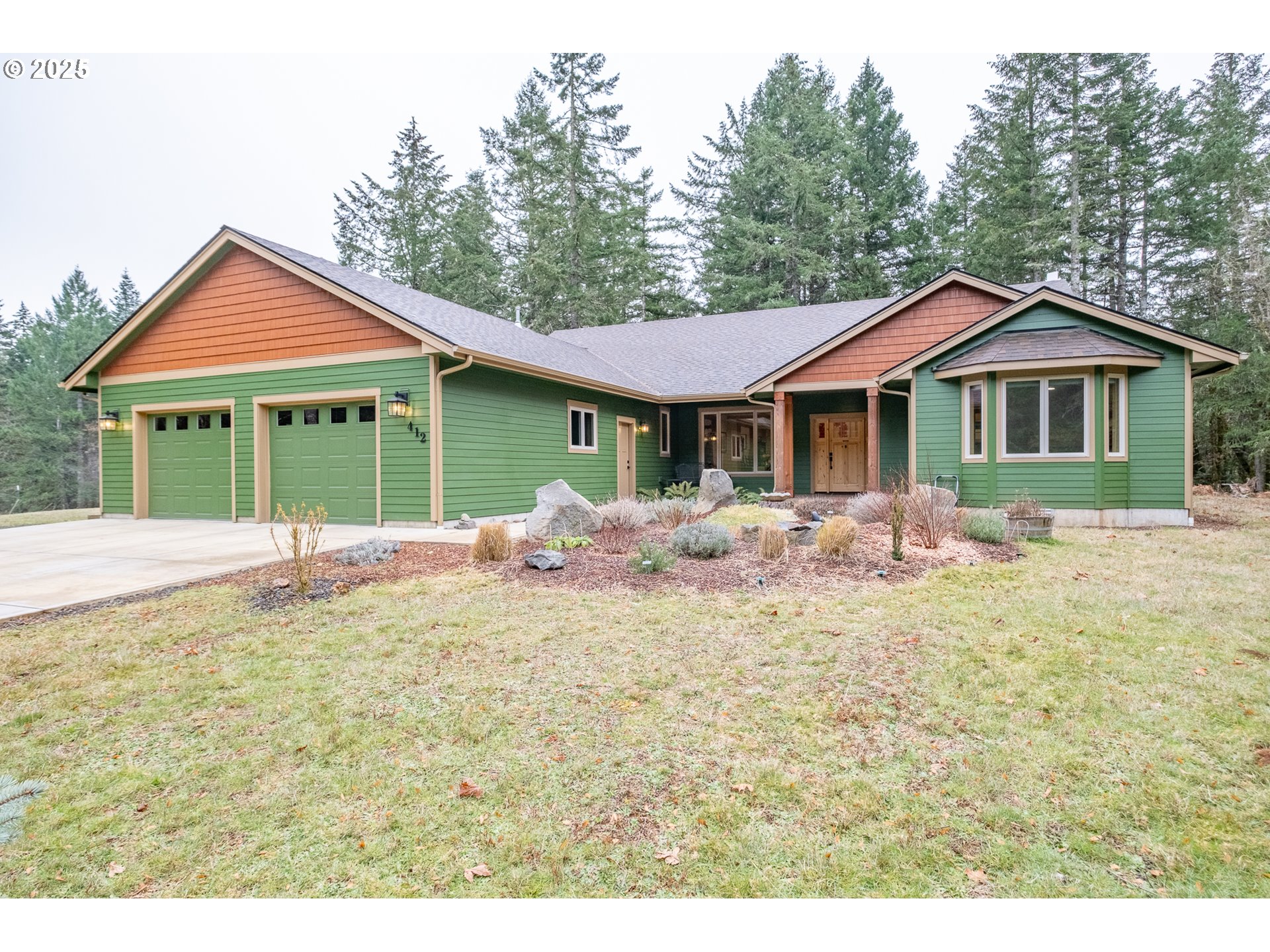 412 Reuben Boise Road Dallas, OR 97338 - Photo 11 of 48 a front view of a house with a yard