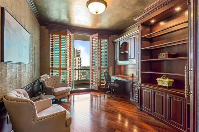 a bed room with a bed and a chair