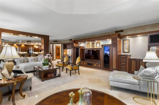 a view of a hallway with wooden floor and glass door