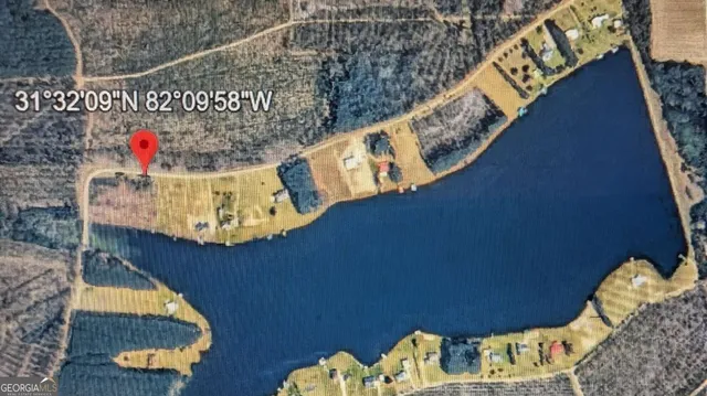 a room with water heater and wooden floor