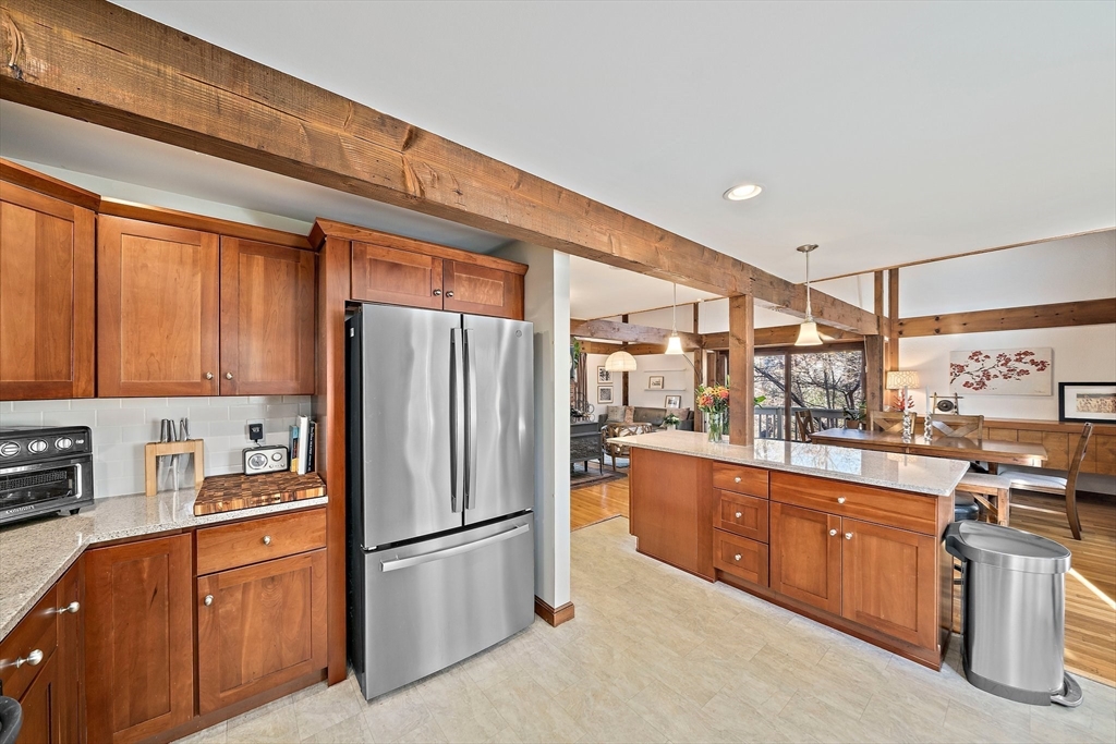 24 Pammys Path Easton, MA 02356 - Photo 15 of 39 a kitchen with stainless steel appliances granite countertop a refrigerator sink and cabinets