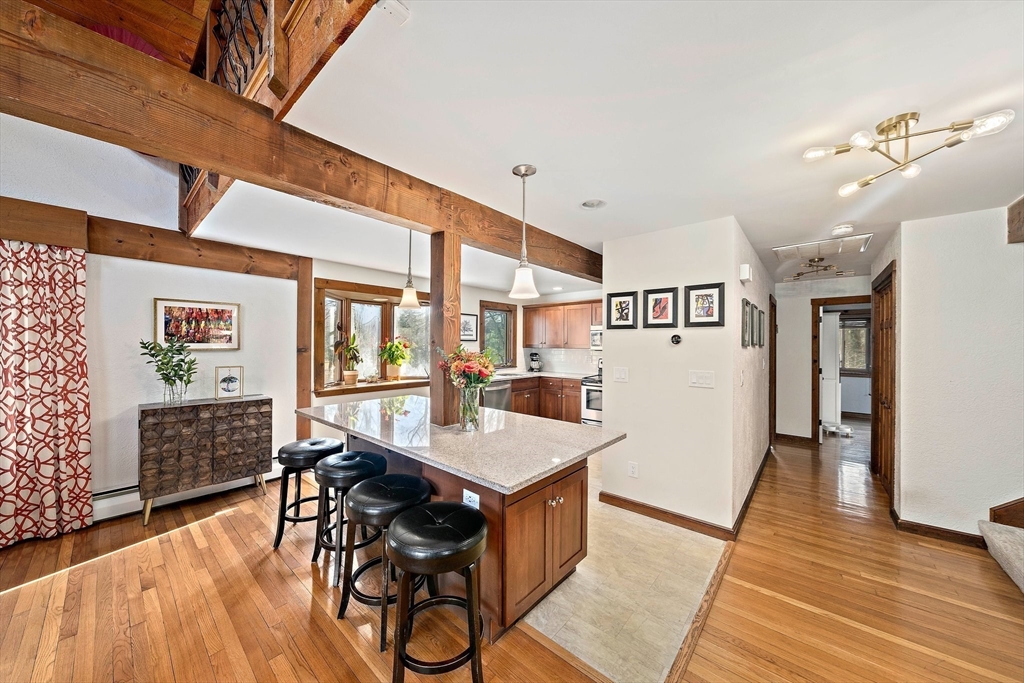 24 Pammys Path Easton, MA 02356 - Photo 18 of 39 a view of a dining room with furniture and wooden floor