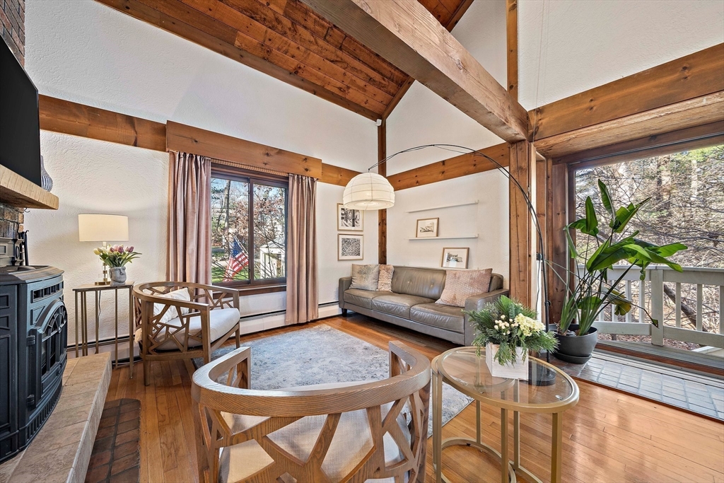 24 Pammys Path Easton, MA 02356 - Photo 19 of 39 a living room with furniture and a large window
