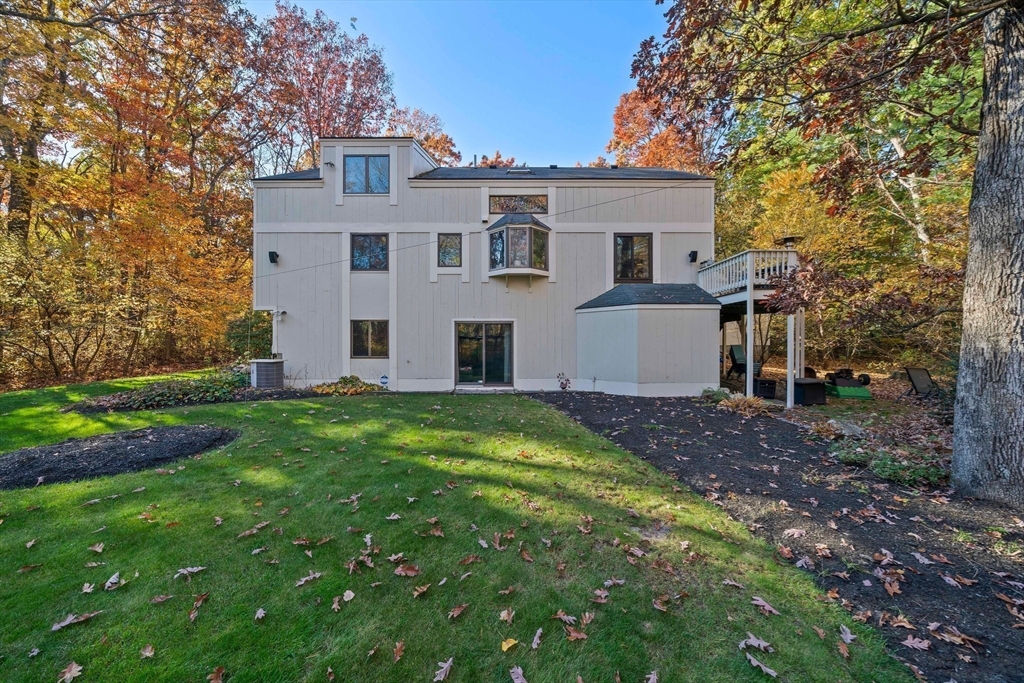 24 Pammys Path Easton, MA 02356 - Photo 35 of 39 front view of a house with a yard