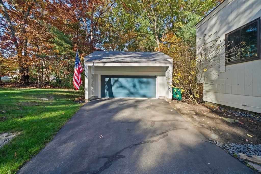 24 Pammys Path Easton, MA 02356 - Photo 6 of 39 a front view of a house with garden