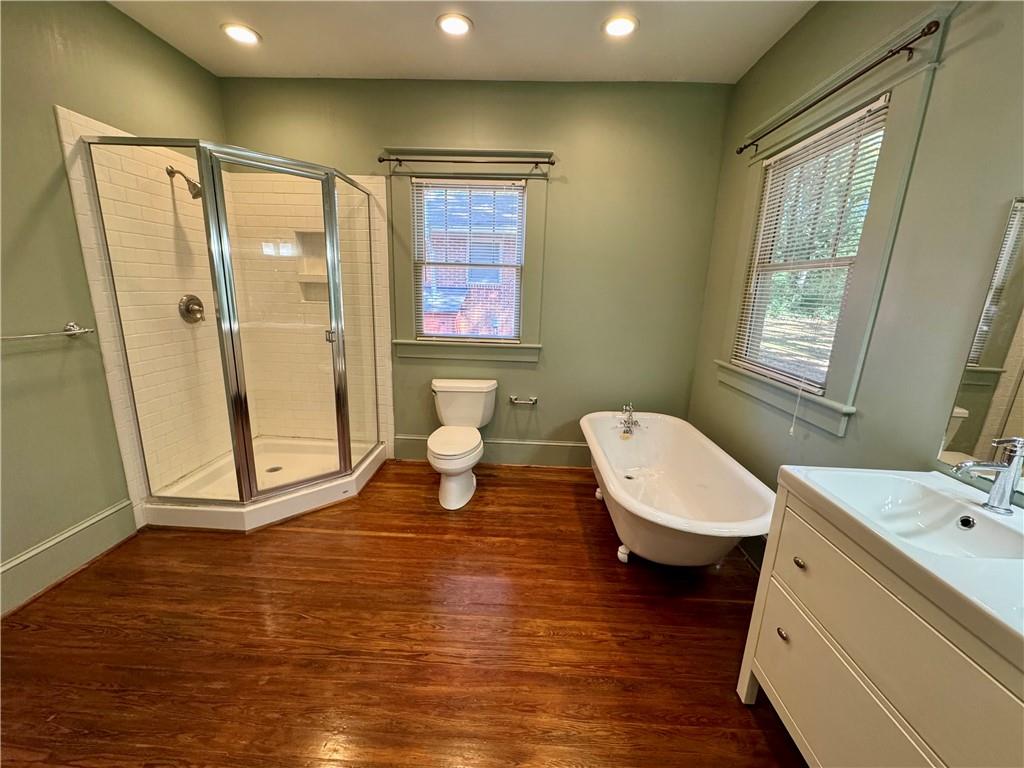 2482 Maple Street East Point, GA 30344 - Photo 24 of 39 a bathroom with a sink a toilet and shower