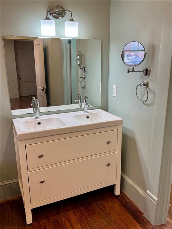 2482 Maple Street East Point, GA 30344 - Photo 26 of 39 a bathroom with a sink mirror and vanity