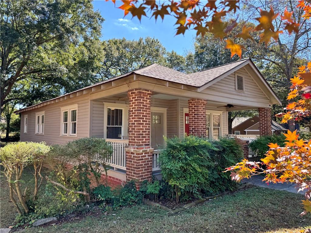 2482 Maple Street East Point, GA 30344 - Photo 31 of 39 a front view of a house with a yard