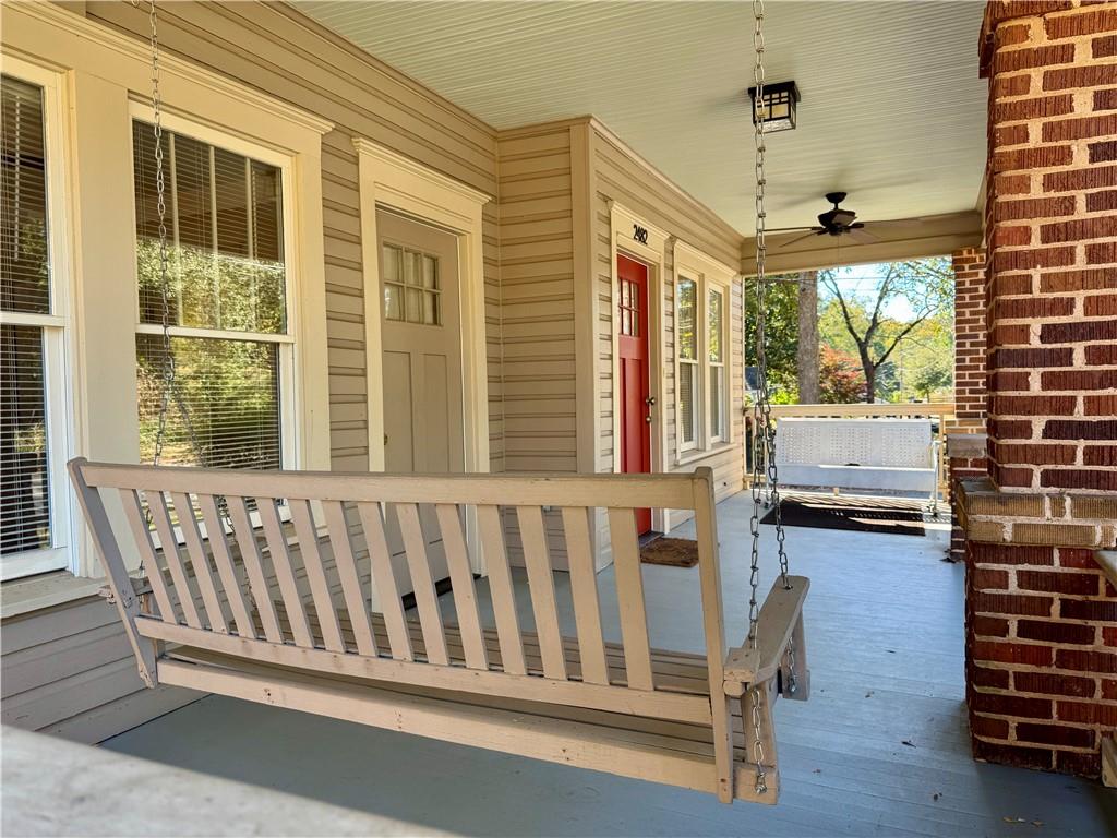 2482 Maple Street East Point, GA 30344 - Photo 33 of 39 a view of a porch with furniture and a window