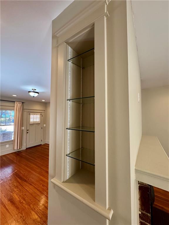 2482 Maple Street East Point, GA 30344 - Photo 8 of 39 a view of a hallway with wooden floor and staircase