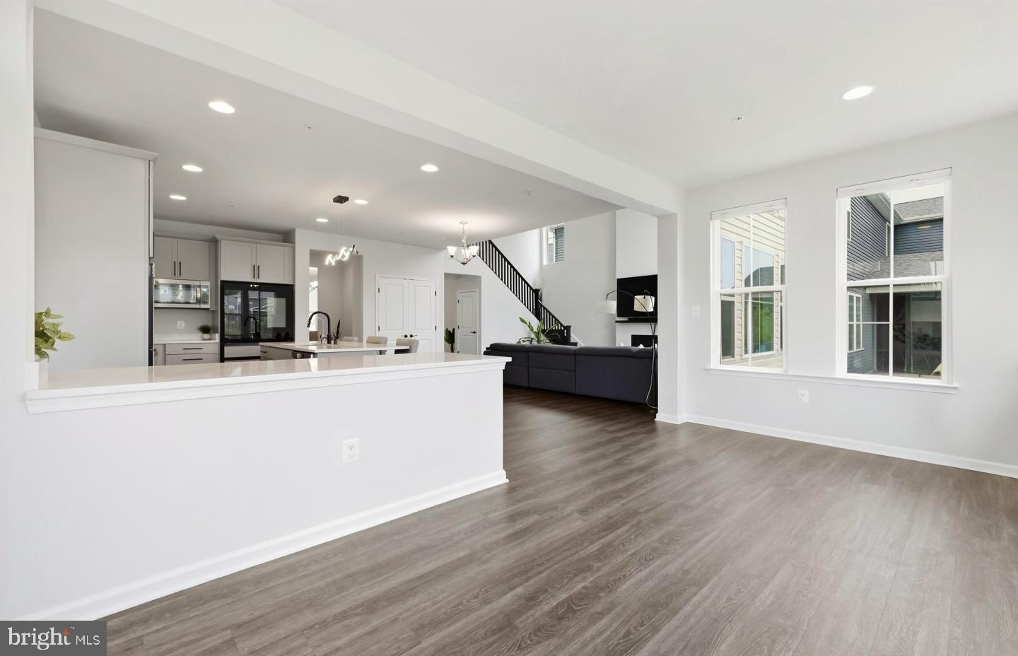5707 Hawk Ridge Road Frederick, MD 21704 - Photo 14 of 109 a view of kitchen with wooden floor and electronic appliances