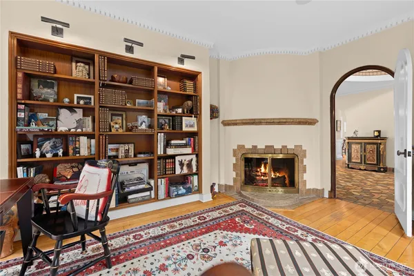 a view of a livingroom with furniture and staircase