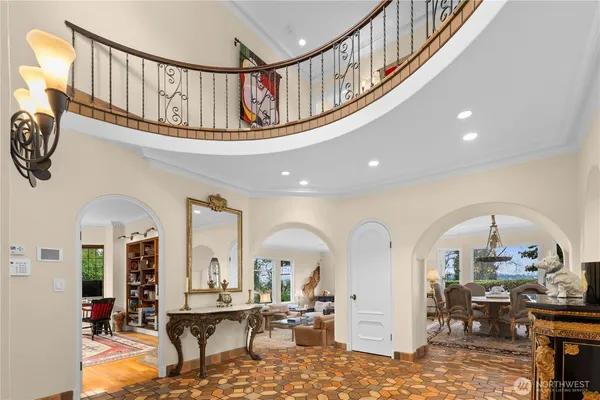 a view of hall way with furniture