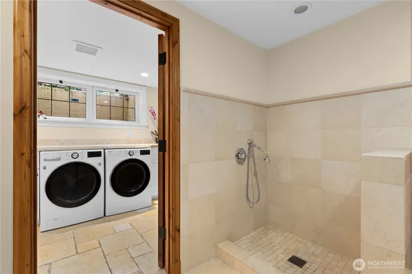 a utility room with dryer and washer