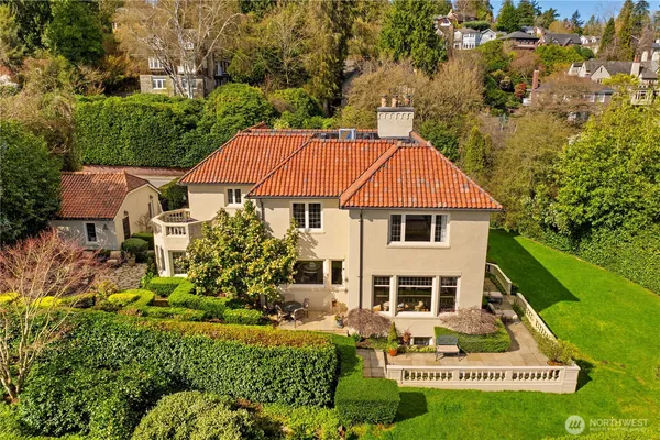 a aerial view of a house with a yard