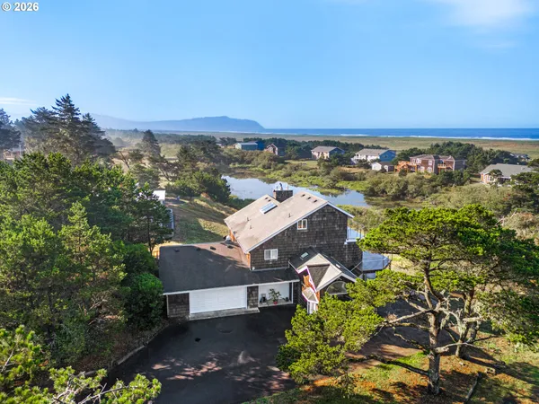 an aerial view of a house with a garden