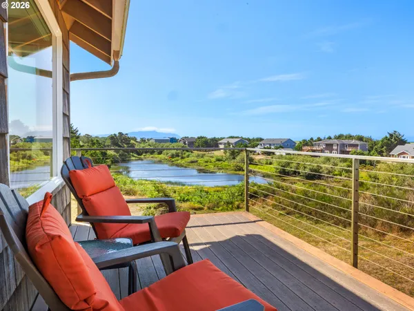a balcony with chairs