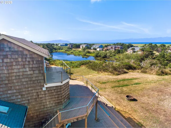 a view of a balcony with an ocean view