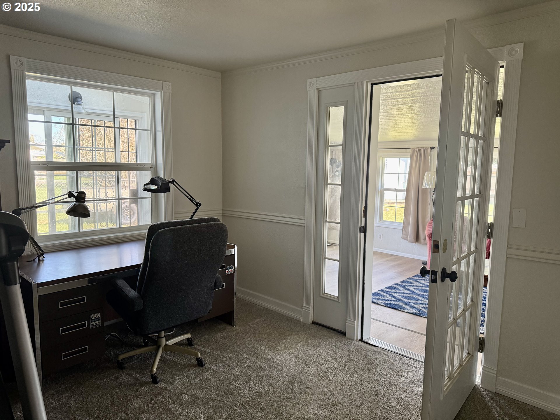345 38th Street Springfield, OR 97478 - Photo 14 of 29 a view of a workspace with furniture and a window