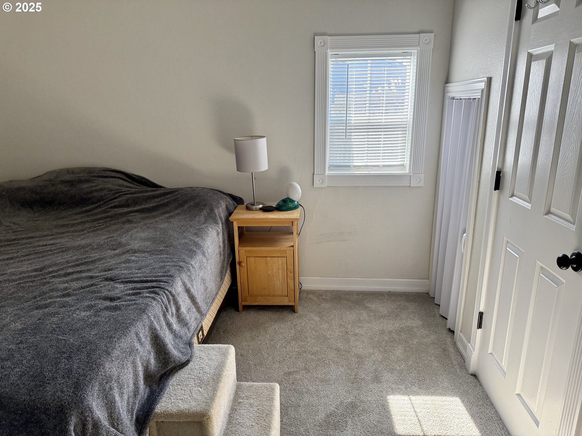 345 38th Street Springfield, OR 97478 - Photo 15 of 29 a bedroom with a bed and a window
