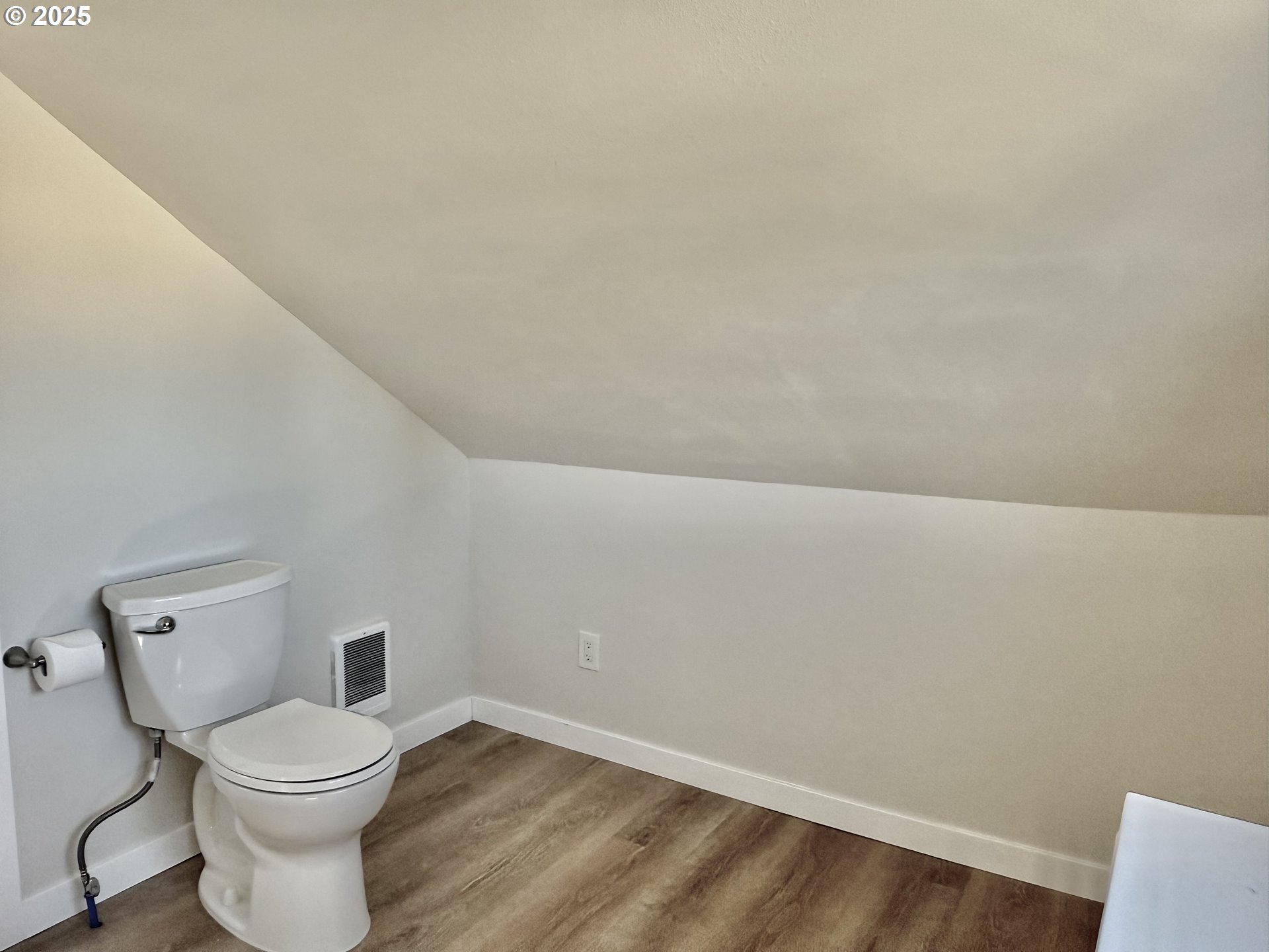 345 38th Street Springfield, OR 97478 - Photo 19 of 29 a white toilet sitting next to a white wall