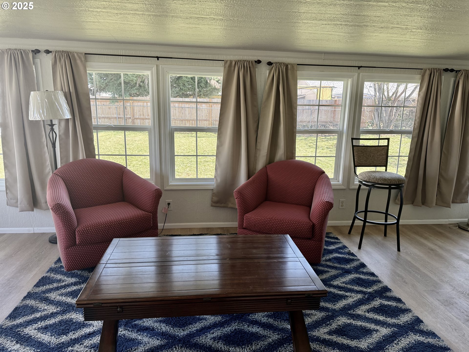 345 38th Street Springfield, OR 97478 - Photo 24 of 29 a living room with furniture and a rug