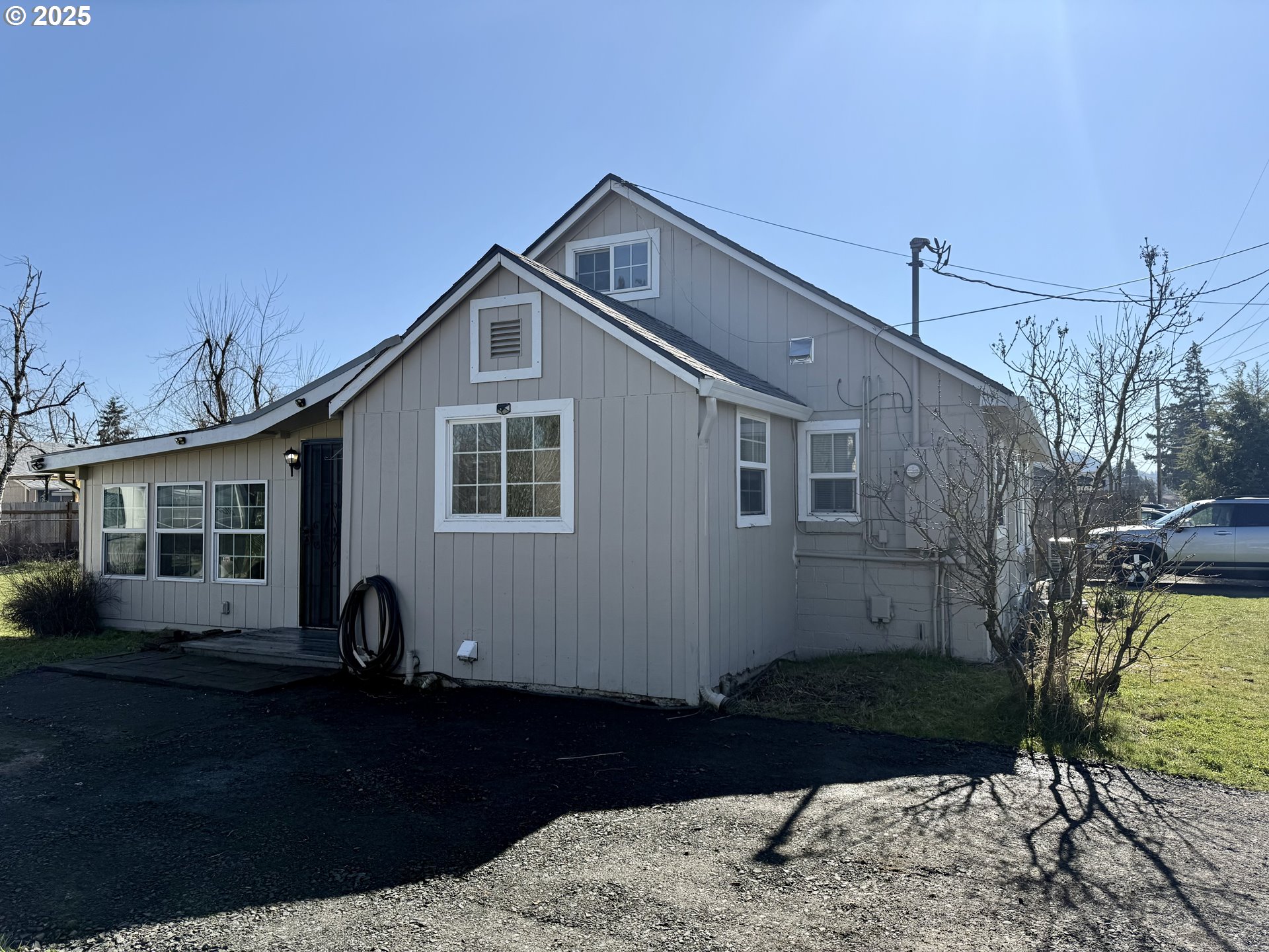 345 38th Street Springfield, OR 97478 - Photo 26 of 29 a front view of a house with garden