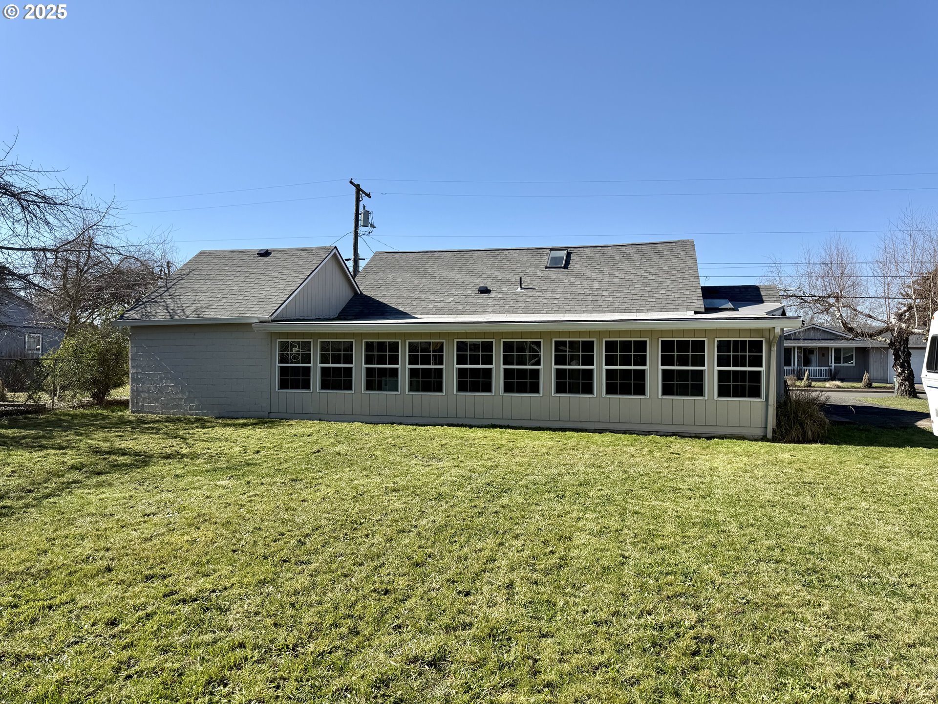 345 38th Street Springfield, OR 97478 - Photo 27 of 29 a view of a house with a yard